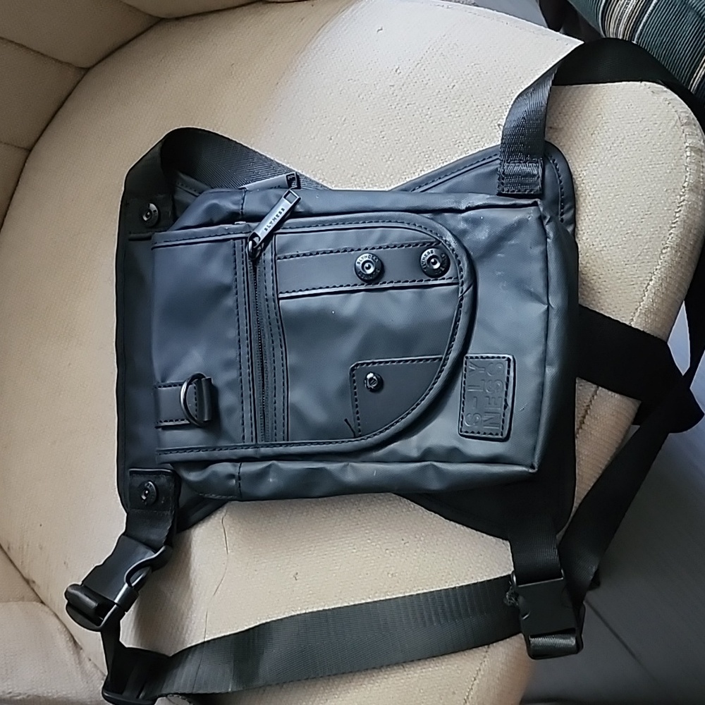 By S-LY NESS black vinyl drop bag with leg and hip straps